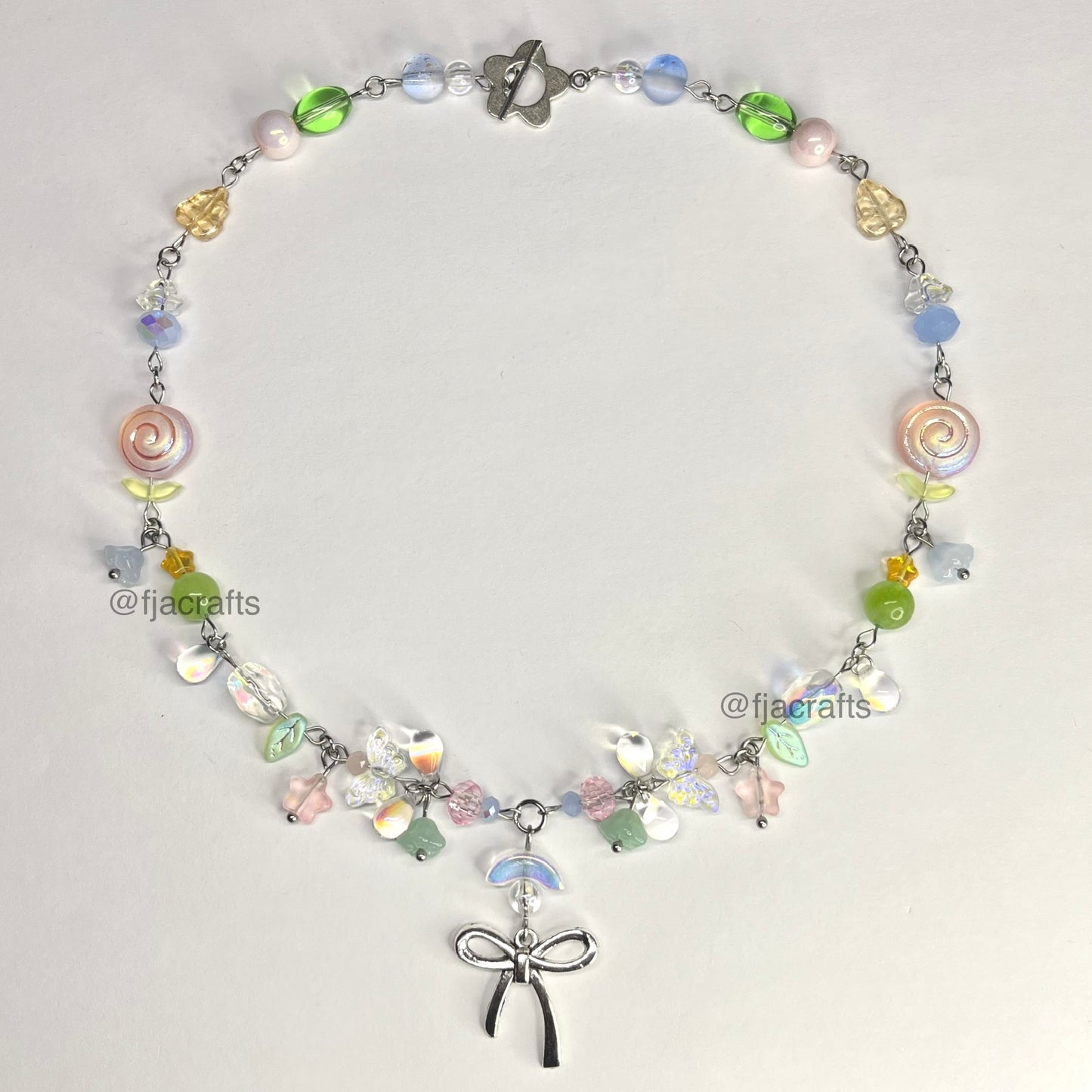 Elegant Garden Clutter Necklace | jiggly, ribbon, flowers | yellow, pink, pink, blue green FJA Crafts